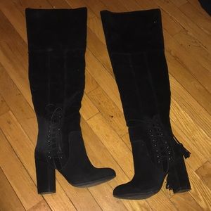 Shoe dazzle thigh high boots.